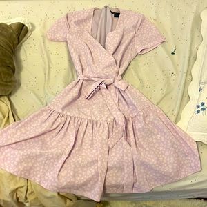 I’m selling this lavender color fresh spring dress. With very nice material.